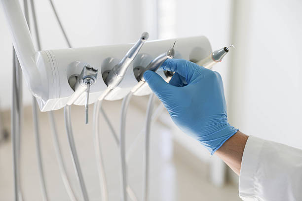 Professional Tooth Extraction technician working in Bay City, TX
